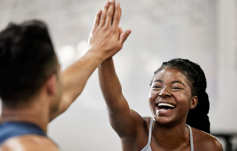 Personal Training in Brooklyn Sports Club high five