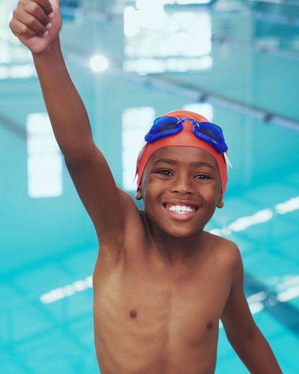 Little Boy Swimming at Indoor Brooklyn Pool